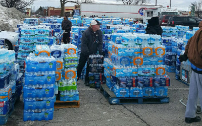 LOCAL NONPROFIT EMPLOYEES STEP UP COLLECTING THOUSANDS OF BOTTLES OF WATER TO HELP FLINT RESIDENTS